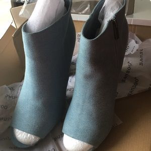 Brand new denim jeans boots.